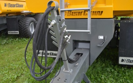 Hydraulic hoses enter welded frame at base of tongue to reduce snagging of hoses.